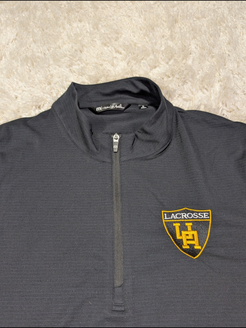 Travis Mathew Black Quarter-Zip Pullover with Upper Arlington Lacrosse Crest